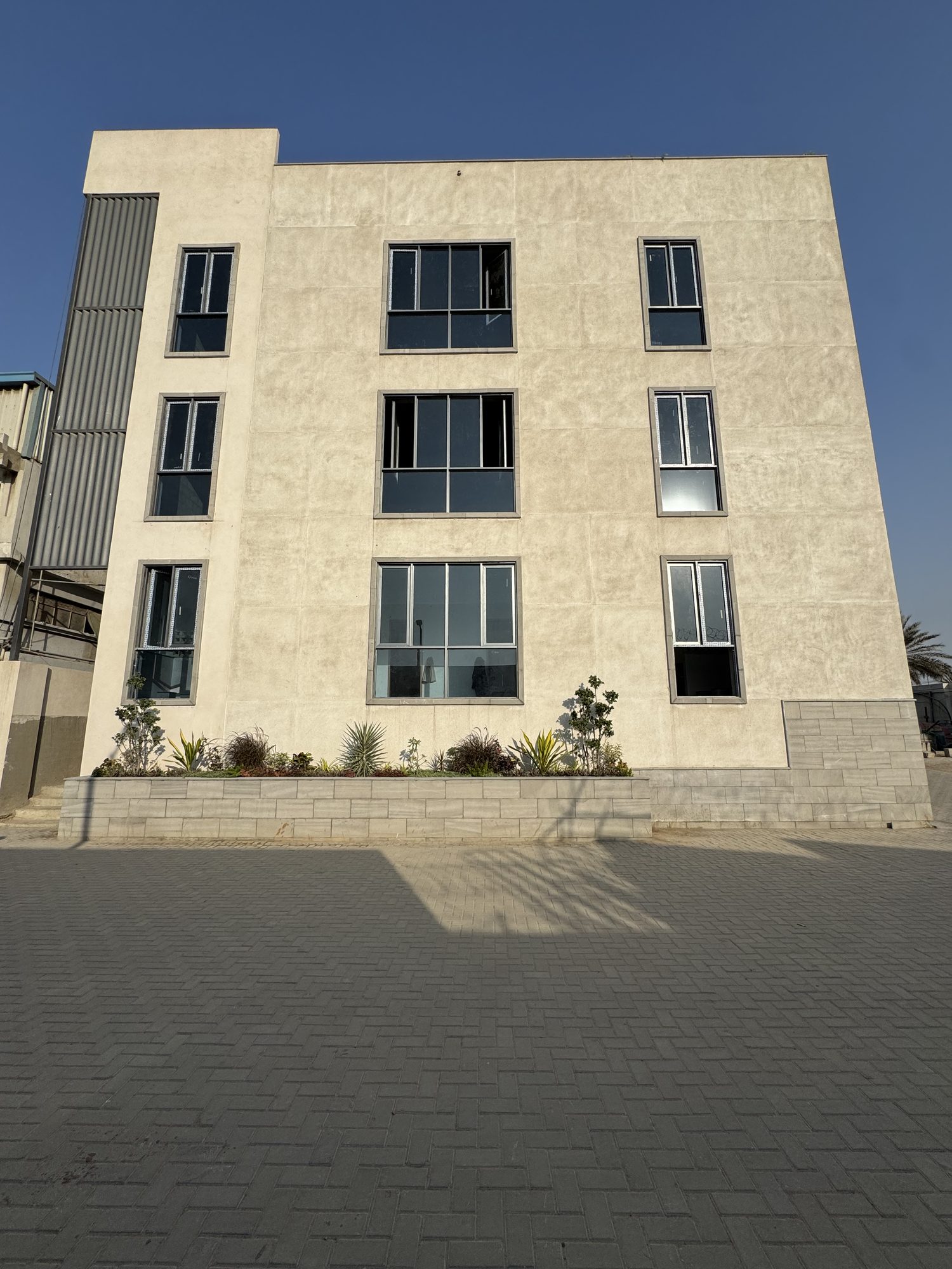 AGI K14A — Office Building — AGI Denim commercial / office in Korangi, Karachi, Pakistan — view 1